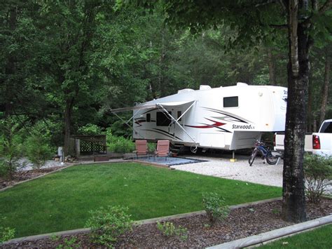 Mountain stream rv park - Peaceful mountain park on lyrical stream. Beautiful trees, bright flowers, rolling play lawn. Highly rated Good Sam park. 37 full hookup level sites with picnic tables and fire pits. …